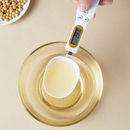 Cuillère doseuse pour peser liquide