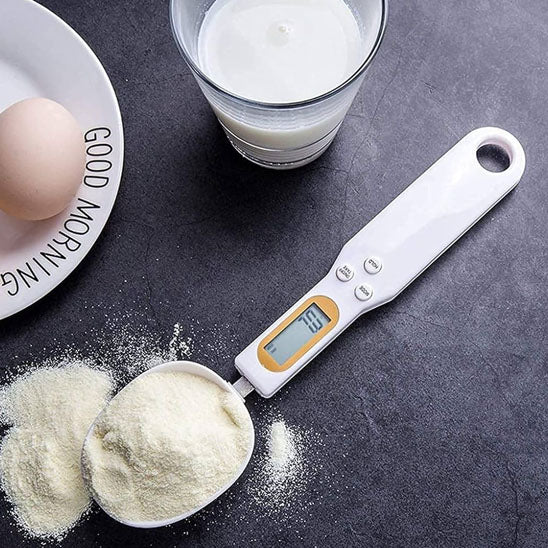 Cuillère doseuse pour peser rapidement